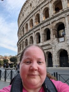 A photo of Carolina outside the Colosseum.