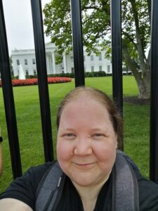 A photo of Carolina outside the White House.